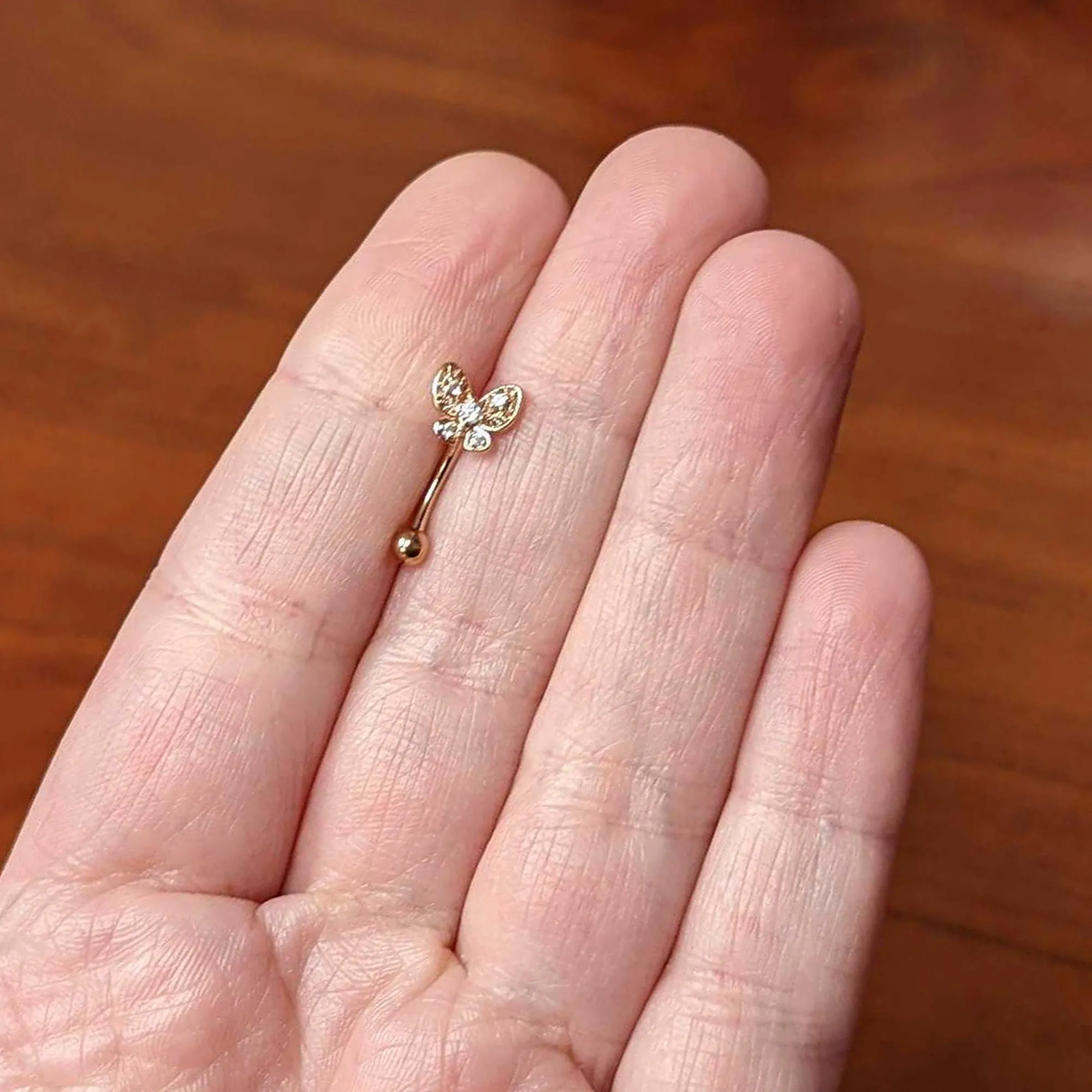 16 Gauge 5/16 Clear Gem Rose Gold Tone Butterfly Curved Eyebrow Ring