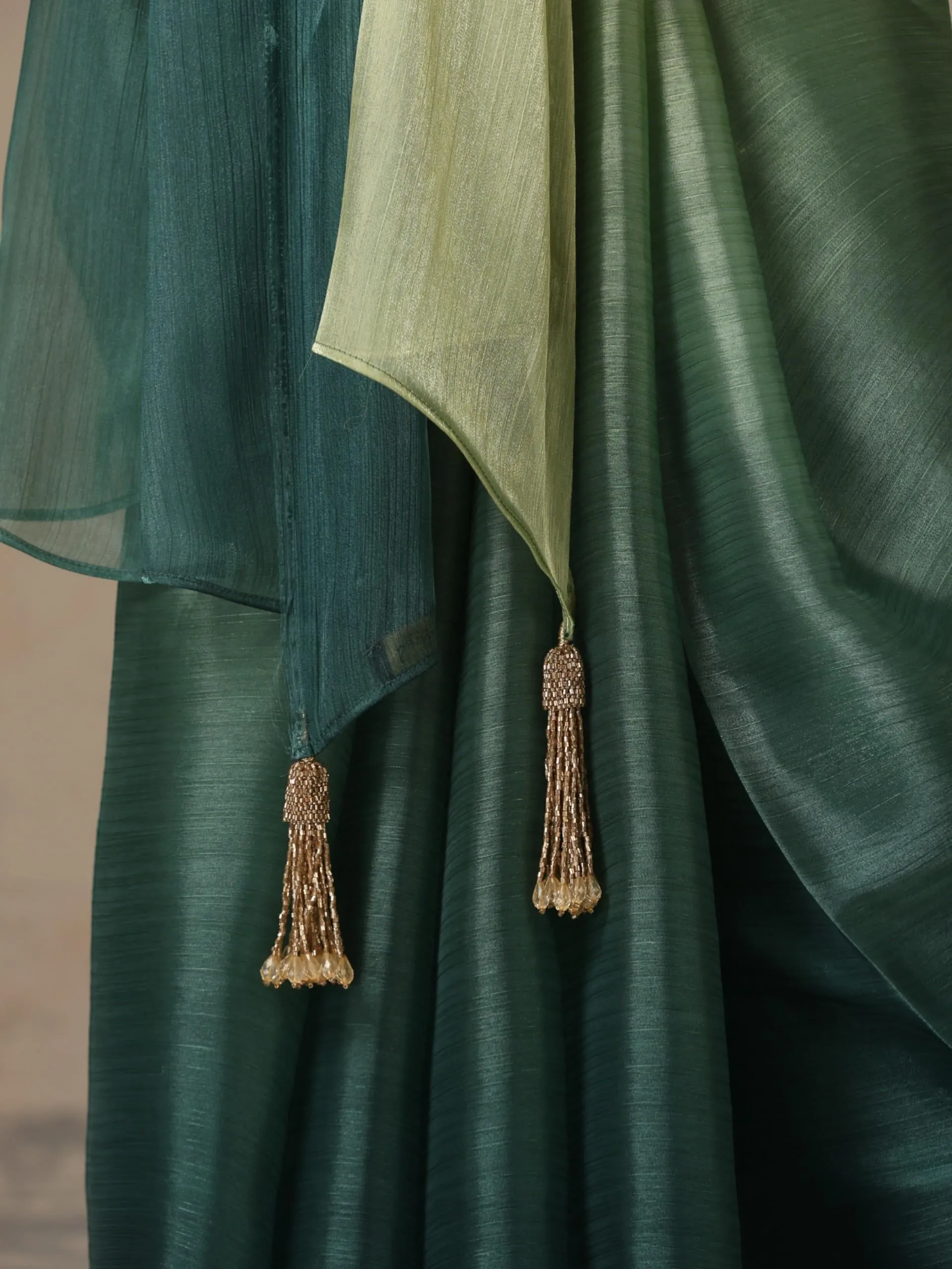 Offbeat Green Ombre Organza Saree with Pendants and Blouse Fabric